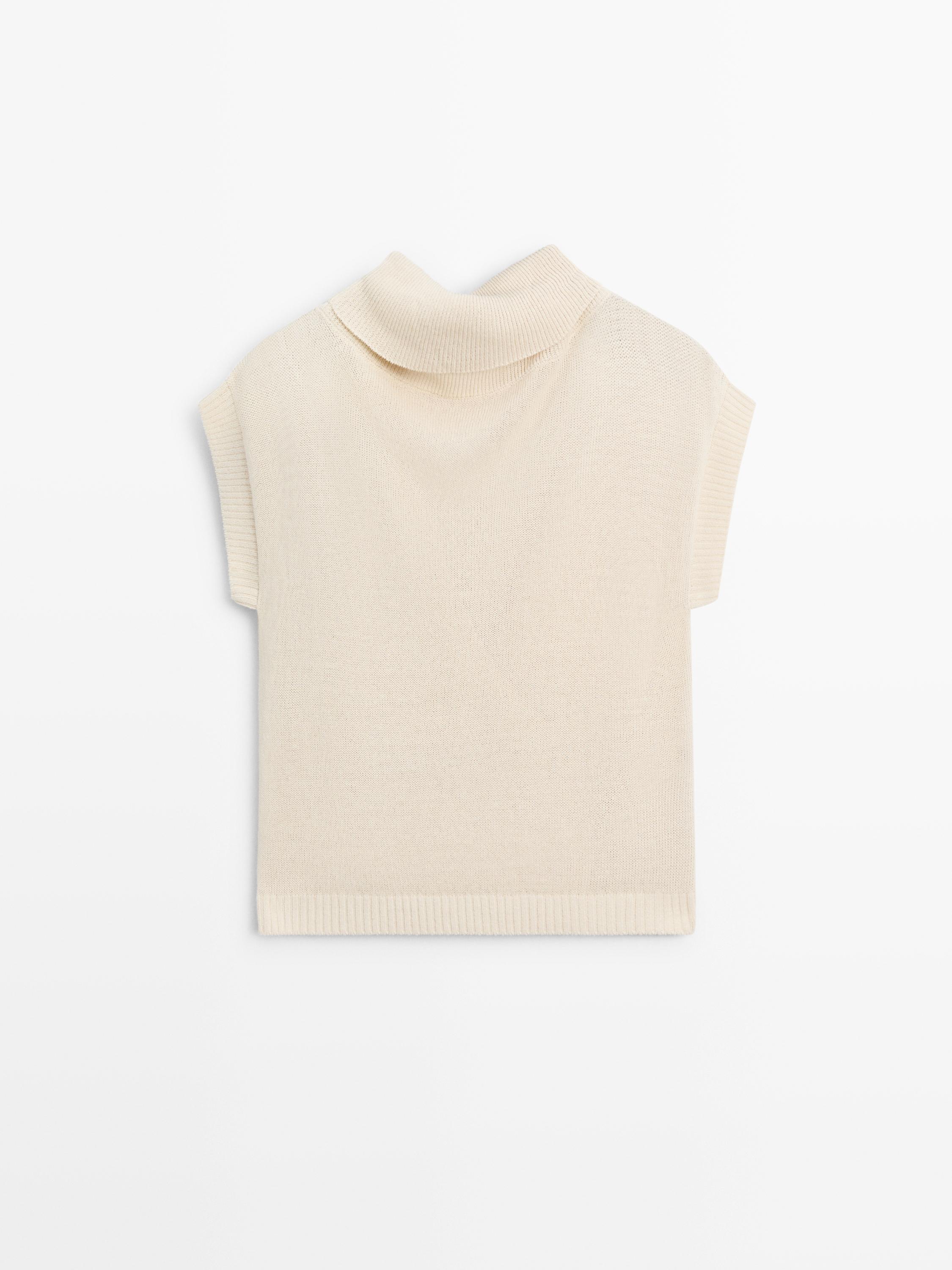 Pull en maille à dos décolleté